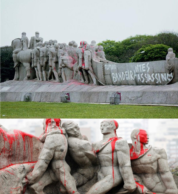 Pichação no Monumento às Bandeiras, com uso de tinta vermelha  e frase “Bandeirantes Assassinos” (São Paulo, 2013)